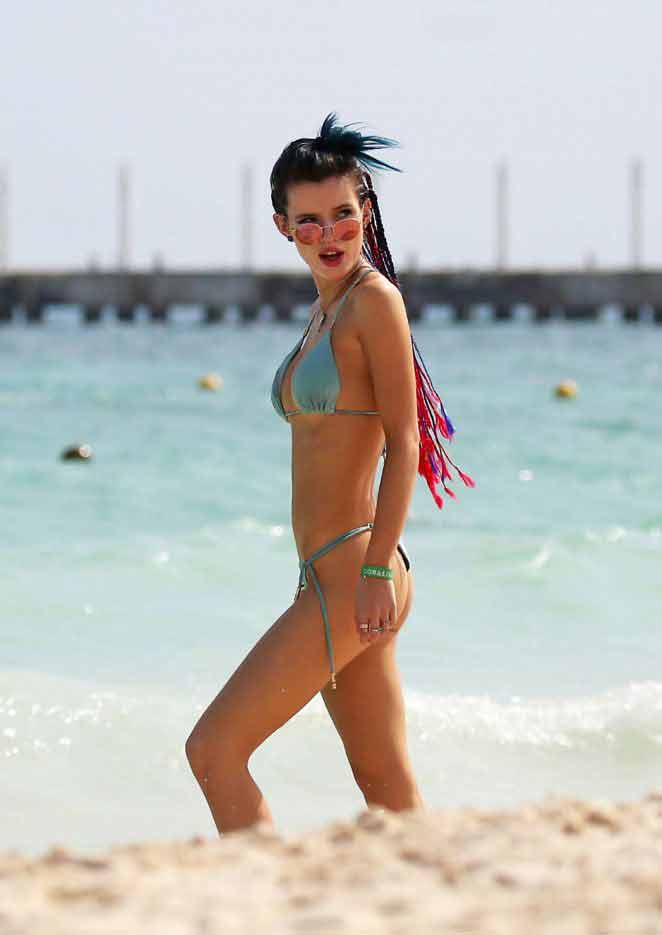 Bella-Thorne-in-Bikini-images-on-the-beach-showing-her-sexy-curves