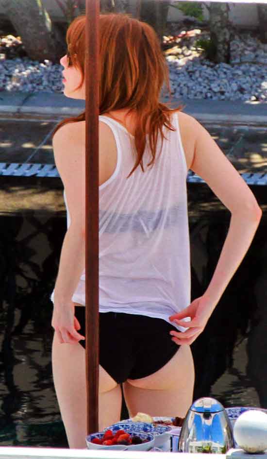 Emma-Stone-Bikini-images-adjusting-her-panty