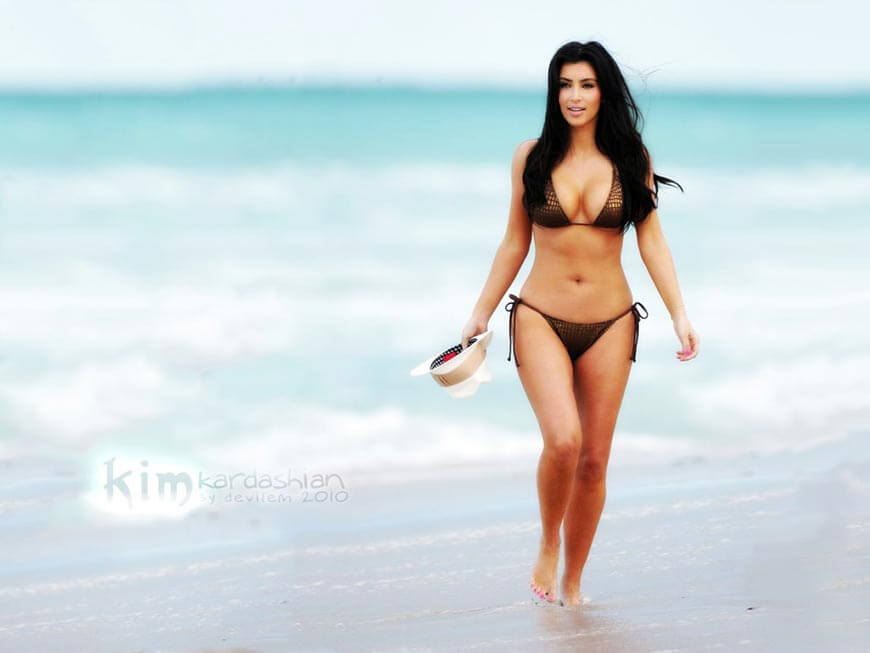Kim-Kardashian-beach-background-wallpaper-in-bikini-swimwear