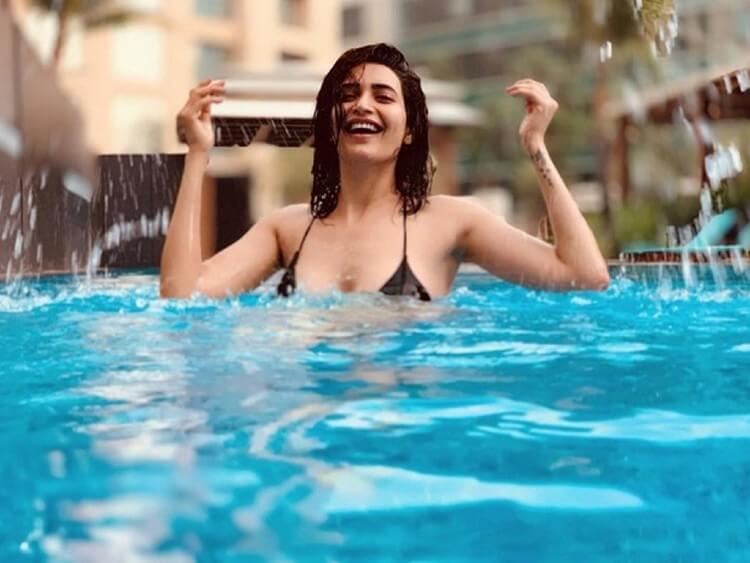 Karishma Tanna Having Fun wearing Bikini in Swimming Pool