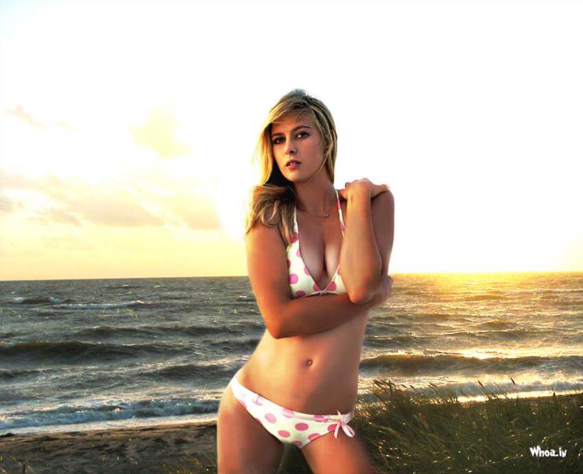 maria-sharapova-in-a-pink-and-white-bikini-on-a-beach