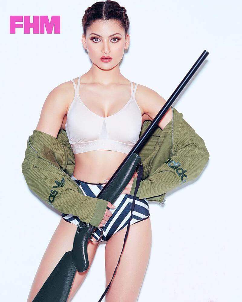 urvashi-rautela-sexy-photo-holding-a-rifle-in-bikini-outfit