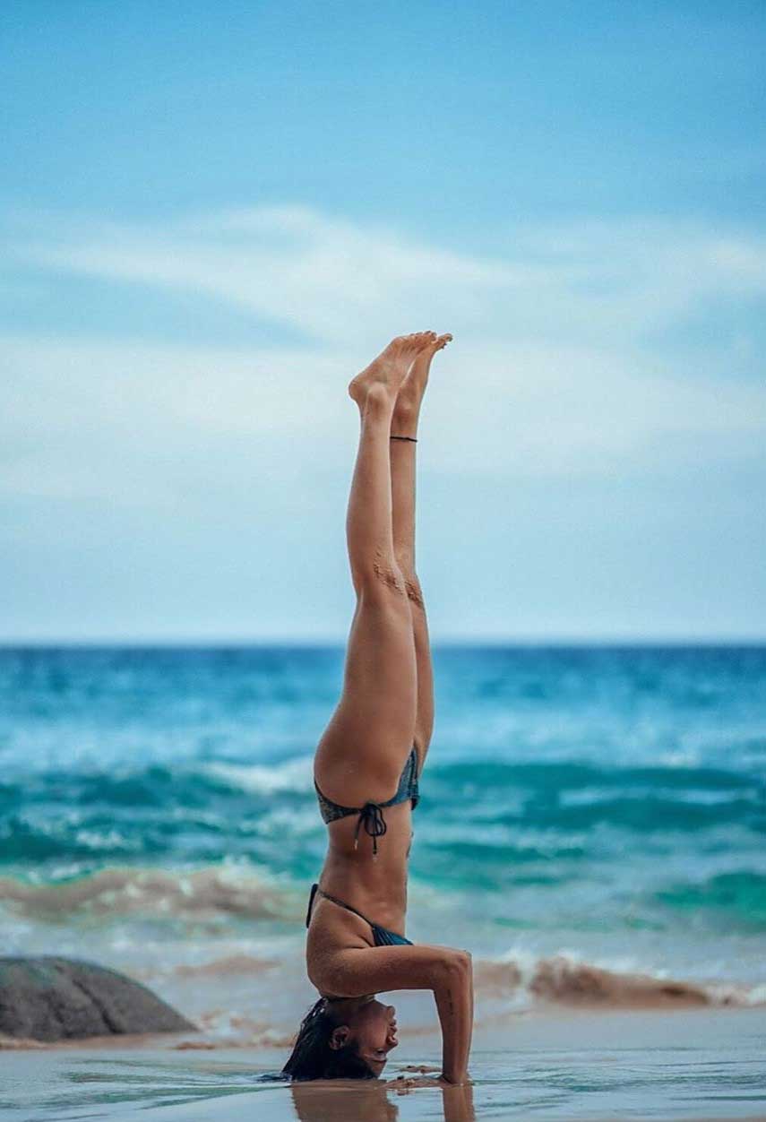 Megha-Gupta-doing-head-stand-in-bikini-at-beach