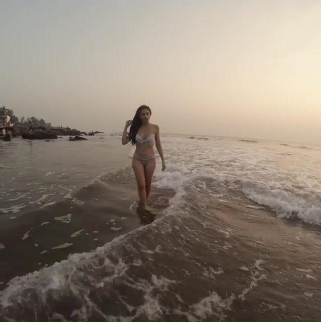 model-tridha-choudhury-in-bikini-showing-her-perfect-curves-on-beach