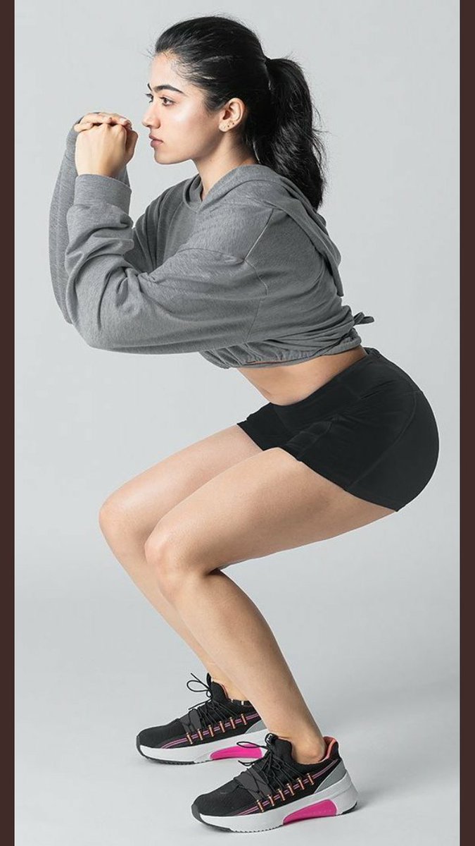 Rashmika-mandanna-hot-gym-workout-pose-exposing-her-toned-legs